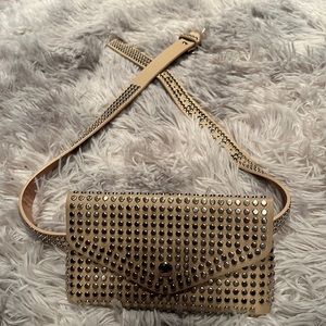 Cream belt bag w/pewter/silver stones on it